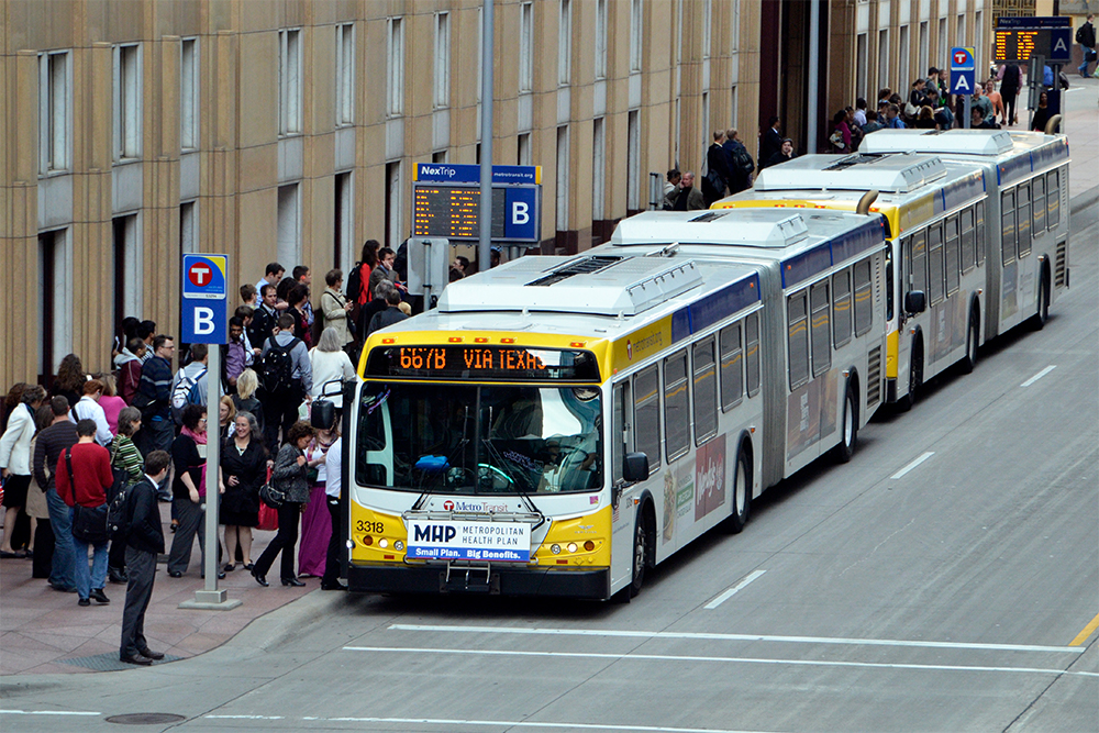 Commuters exit a Metro Transit bus in downtown Minneapolis. 