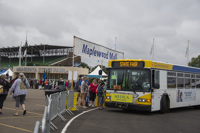 Customers exit Metro Transit express buses at the Minnesota State Fair.